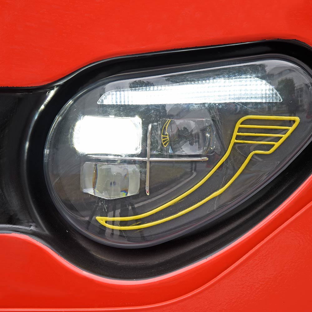 Advanced Lighting System - LED headlights with auto-leveling (high/low beam) complement dynamic streaming turn signals for optimal visibility.
